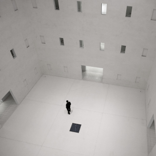 Looking-down-from-a-very-high-floor-at-a-person-staring-wondering-where-he-is