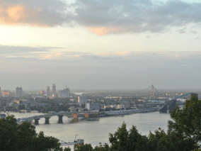 overlook of city, bridge, and river
