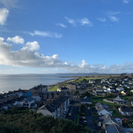 city of Cricieth, Wales along the sea on a beautiful day